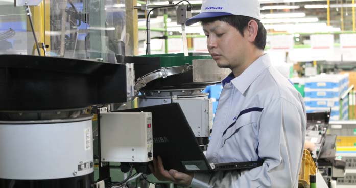 働いている佐藤さん